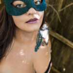 woman in black bunny mask